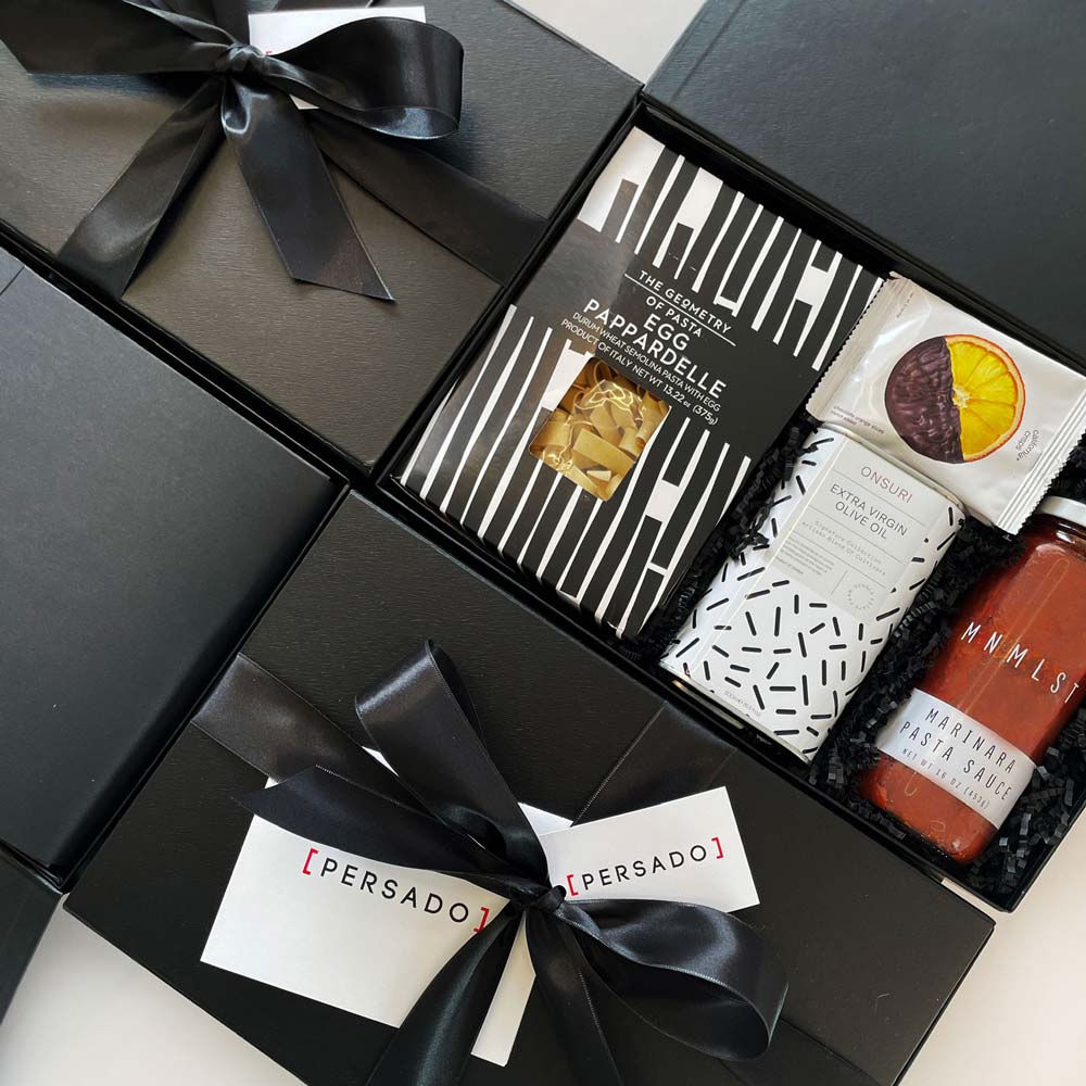 custom corporate pasta gift box for persado. Gifts include pasta, marinara pasta sauce, olive oil, orange sliced chocolate and more
