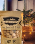 Package of 'Base Camp Treats' fire roasted s'mores with a blurred outdoor background