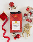 ravens nest mulling spice cider mix with festive accessories around it