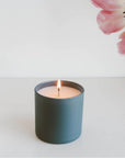 soy wax candle in blue ceramic vessel