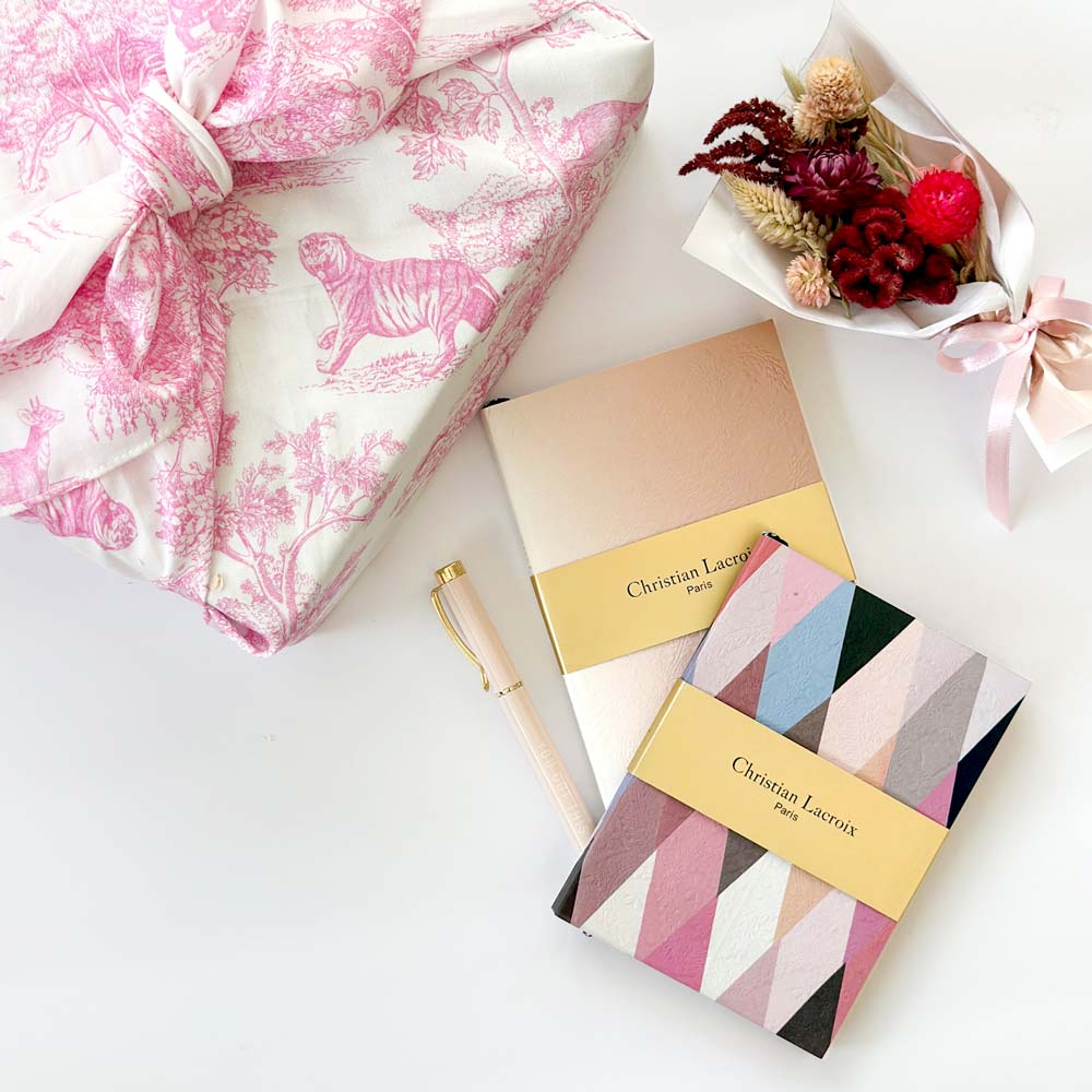 Christian Lacroix Paris Notebook with pen, dry flower bouquet, pink furoshiki fabric wrapped gift box and more