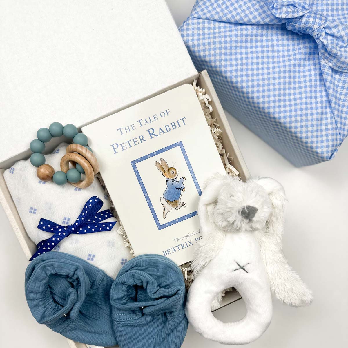 kadoo baby boy bunny gift box with baby shoes, swaddle, peter rabbit book, rattle and more