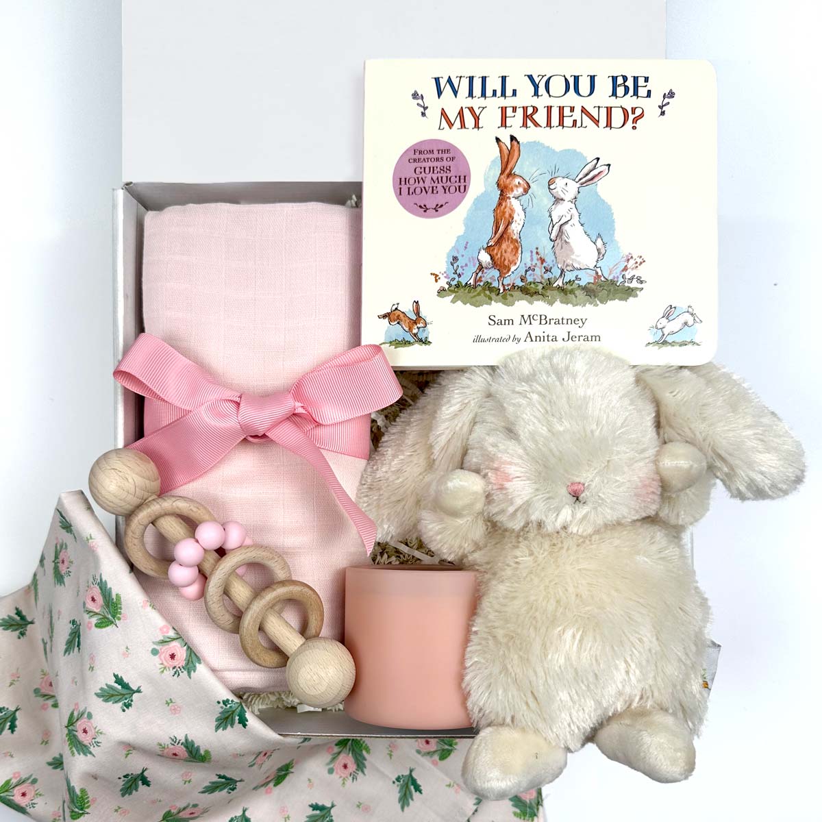 kadoo baby gift box with bunny stuffed animal, pink baby blanket, wooden rattle, pink candle, will you be my friend board book and more