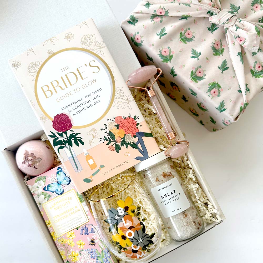 Bride to Be curated gift box, perfect for wedding party and bridal gift. Contain Bride's guide to glow, strawberry biscuits, bath salt and more. Wrapped in rose furoshiki fabric.