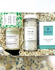 kadoo calm spa curated gift box. gifts included lavender bath salt, olive flower soy candle, tea tree peppermint soap, jasmine tea and more