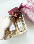 kadoo relax spa rose day curated gift box. gift items: rose oud candle, relax rose geranimum bath salt, eye mask and more