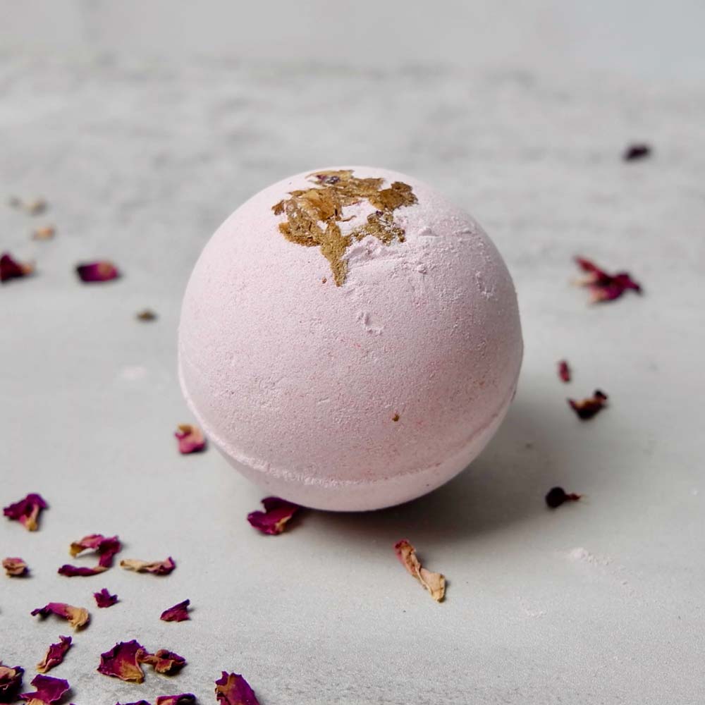 rose bath bomb in pink color by natural amore
