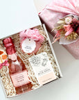 kadoo bridesmaid furoshiki gift box for your wedding party. will you be my bridesmaid bath balm, sugarfina champagne bear, lollipop, & bar soap.