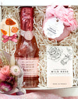 kadoo bridesmaid furoshiki gift box for your wedding party. will you be my bridesmaid bath balm, sugarfina champagne bear, lollipop, & bar soap.