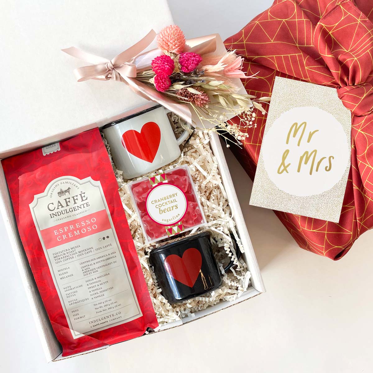 kadoo mr and mrs. wedding curated gift box in furoshiki fabric wrap, with coffee, two heart espresso cups, sugarfina gummy bears & more.