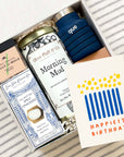 kadoo on the go curated gift box for him includes morning coffee, Que bottle, Wally Whiz wine gums, cracker & more.