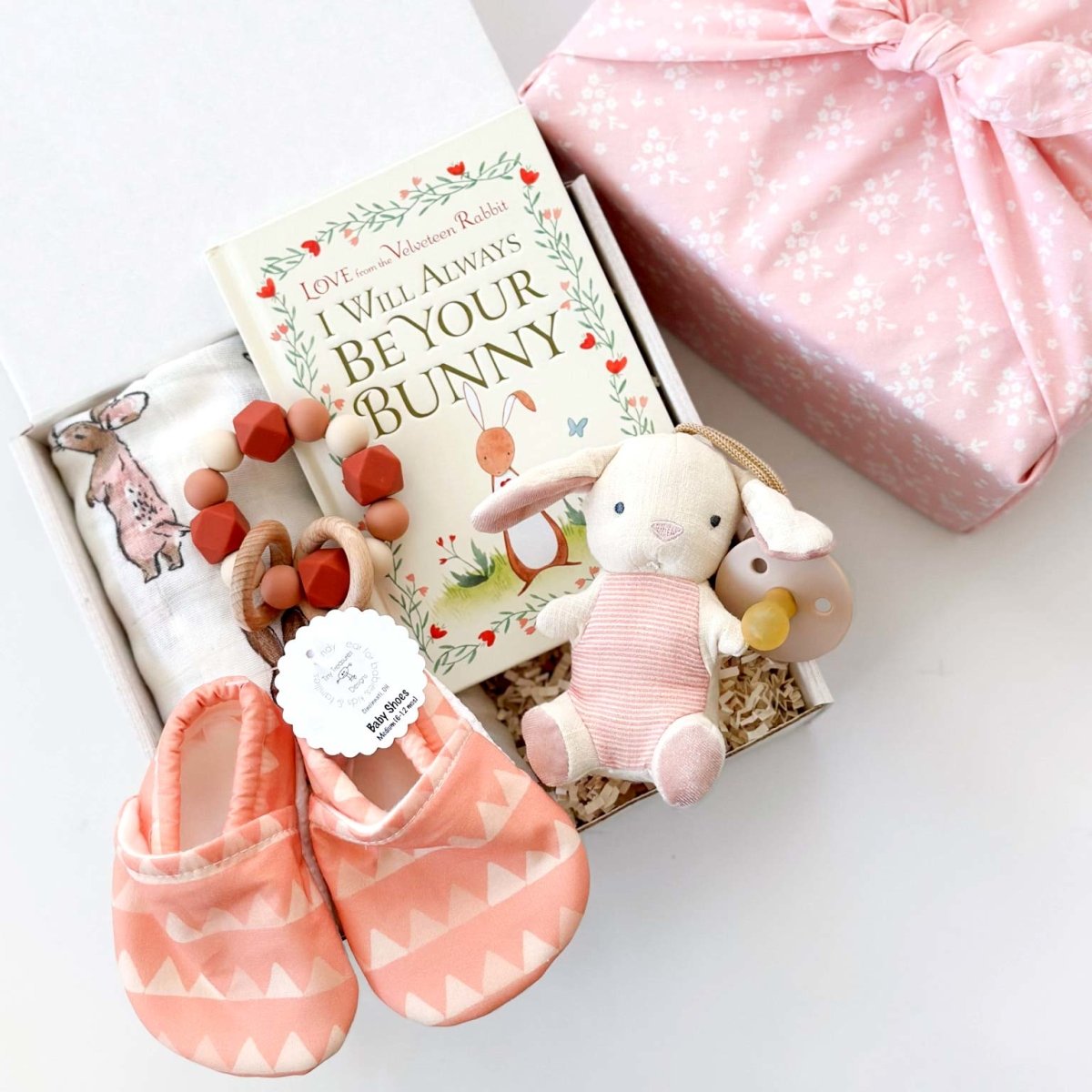 kadoo baby girl sweet bunny furoshiki gift with swaddle, baby shoes, teether &amp; more. Perfect newborn gift.