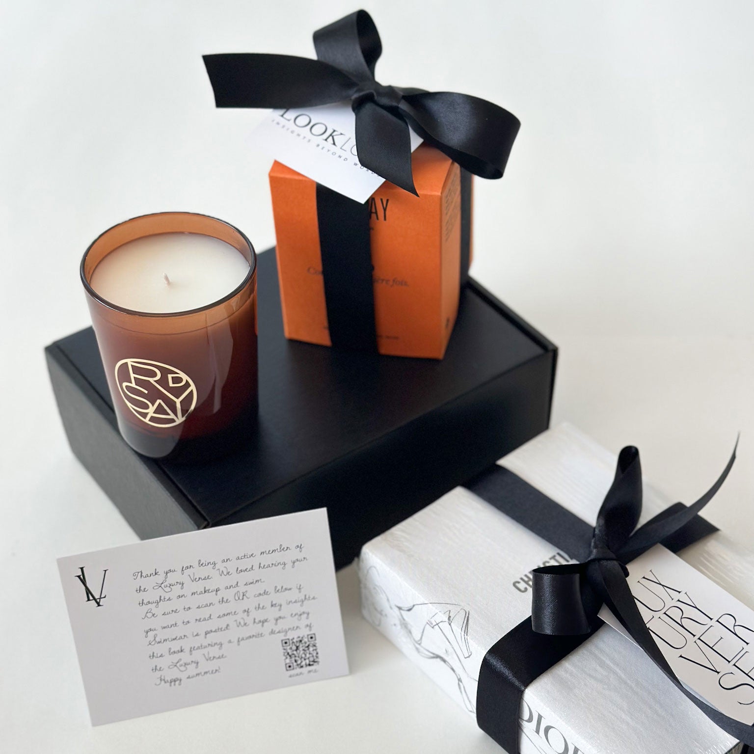 custom corporate luxury gifts with dorsay candle, dior coffee table book and more