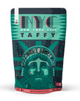 A stand-up pouch package for NYC New York City Taffy, featuring a stylized teal and dark gray Statue of Liberty design with the words 'NYC NEW YORK CITY TAFFY' on a white background.