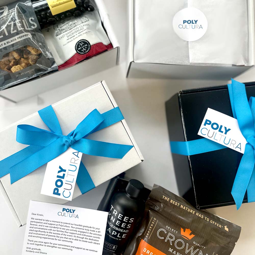 kadoo custom gifts for Poly Prep - Poly cultura event. BRanded gift with blue ribbon, pancake mix, pretzel, chocolate and more
