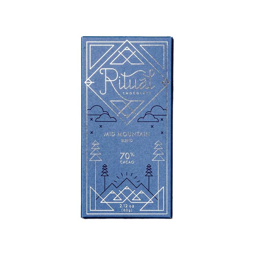 A single bar of Ritual Mid-Mountain Blend chocolate in its blue packaging, shown against a plain white background.