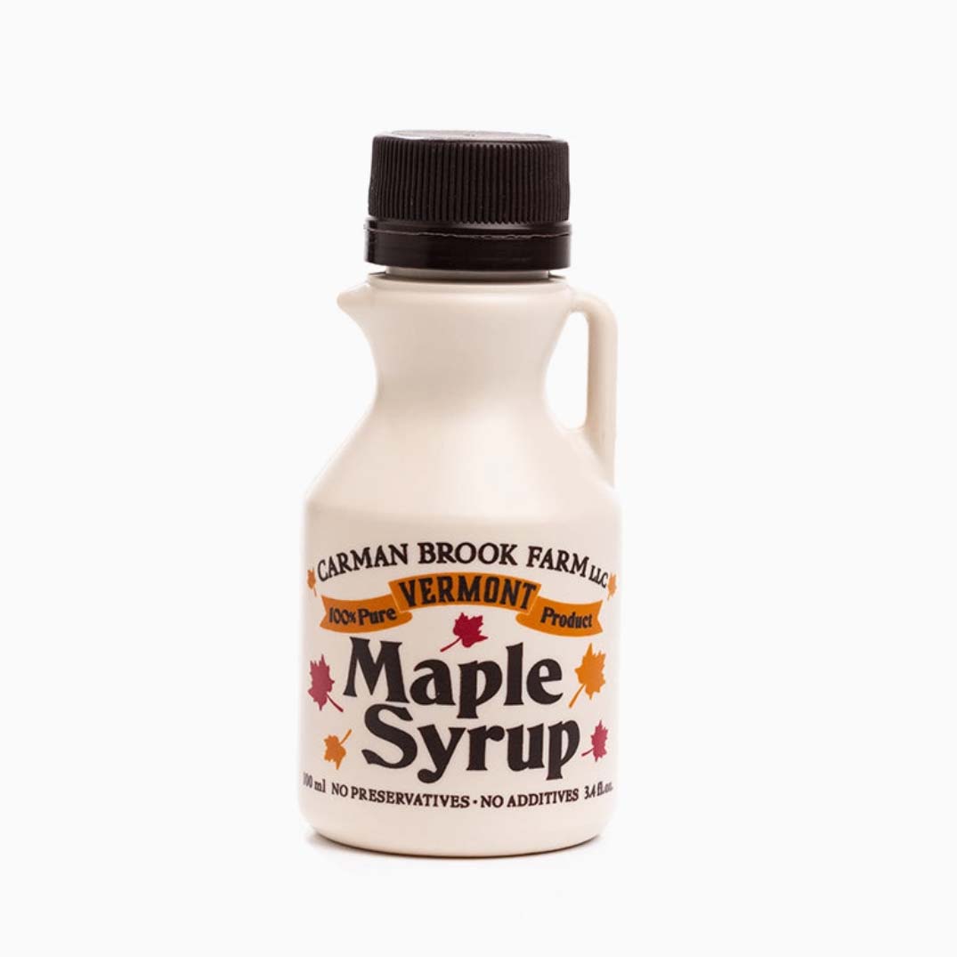 Carman Brook Farm Vermont Maple Syrup bottle on a white background