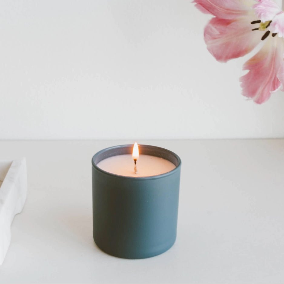 soy wax candle in blue ceramic vessel 