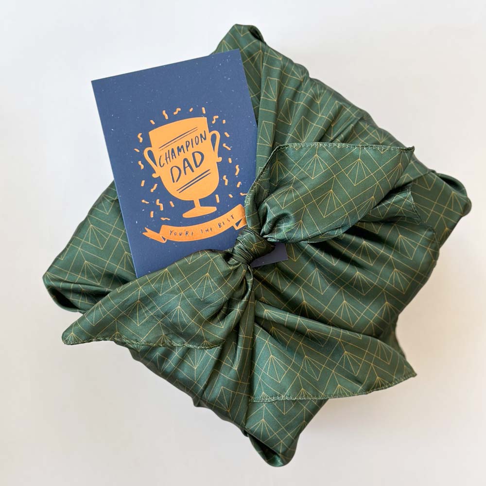 champion dad notecard and green furoshiki fabric wrapped gift box 