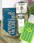 Kadoo Gift set with Spring & Mulberry chocolate, Potager soap, and a card on a white surface.