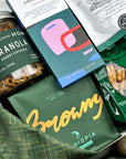 kadoo curated holiday gift box with browny coffee, eleven madison home granola, chocolate society dark chocolate, pretzel and more