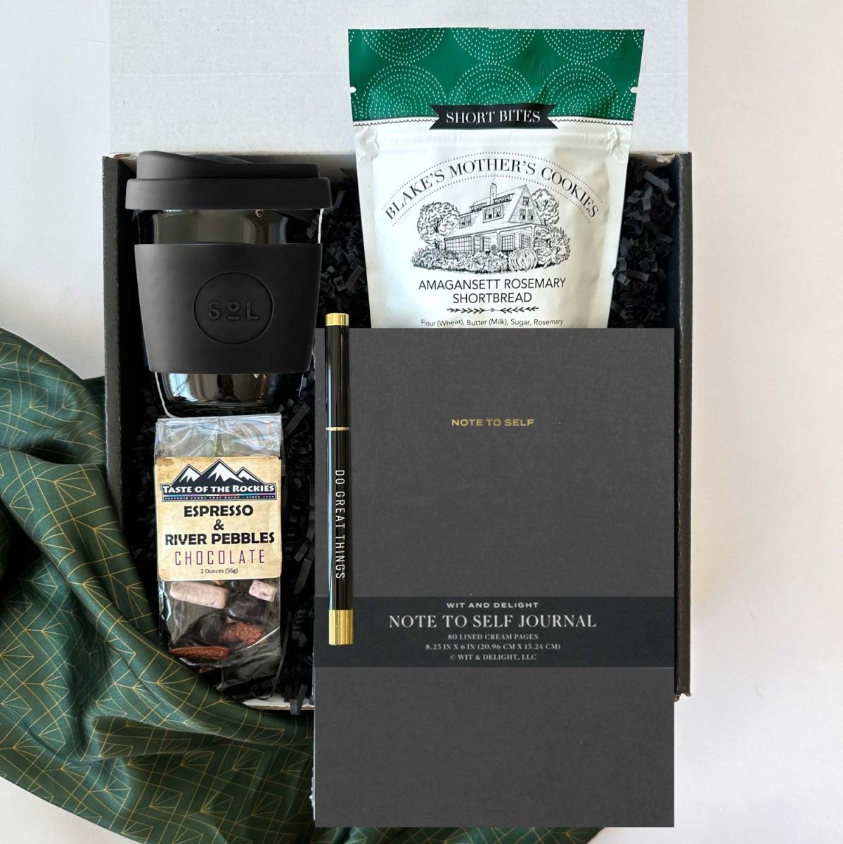 kadoo do great things gift box with black sol cup, shortbread, black notebook, pen, espresso beans chocolate and more