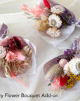 dry dried flower bouquet add on option in pink purple yellow colorway.