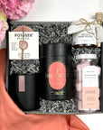 kadoo rose garden gift box with soap, candle, pink rose strawberry tea, sugar scrub, honey, coral linen, gray crinkle paper and more.