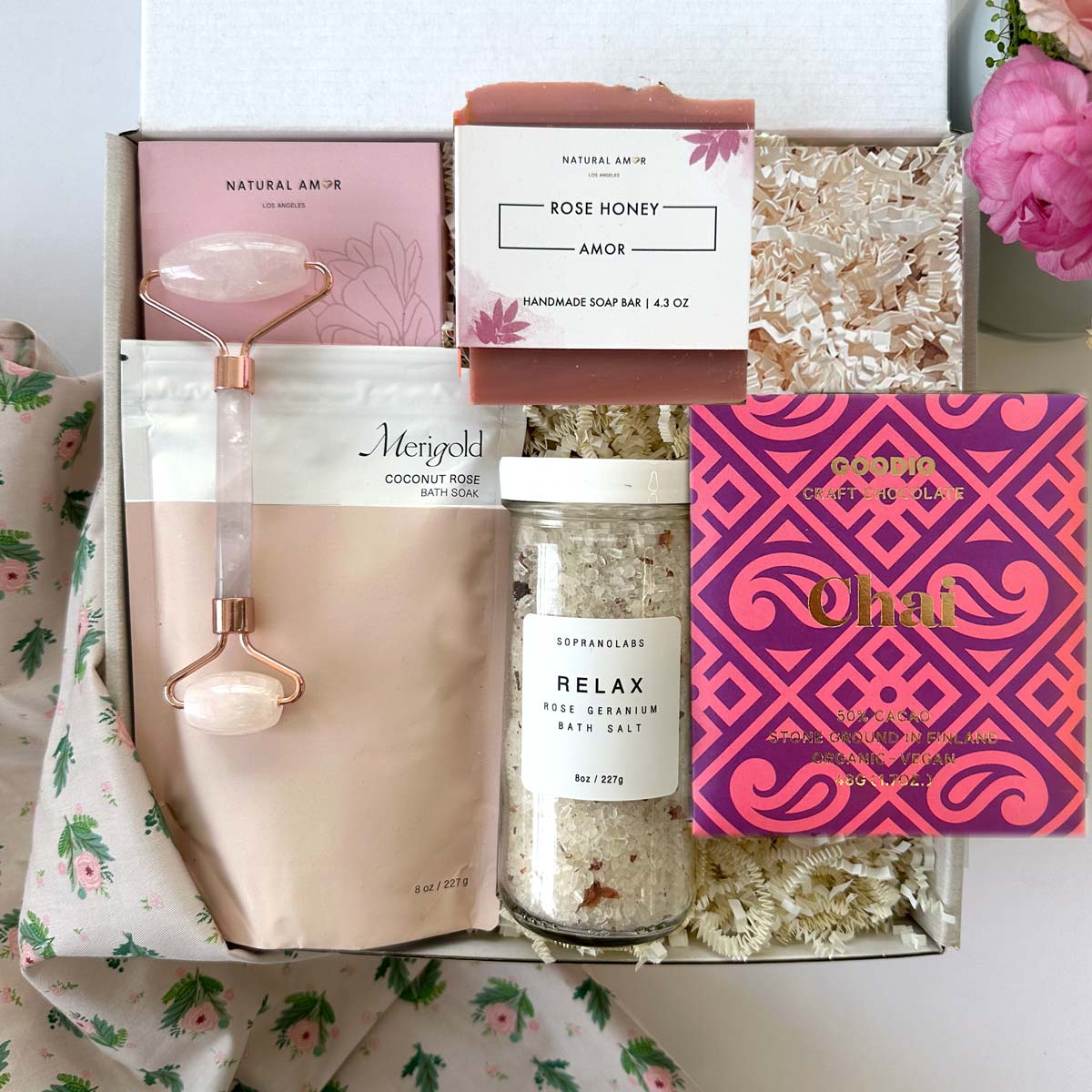 kadoo rose garden gifts. Inside box: bath soak, relax bath salt, farmhouse biscuit, handmade soap, rose quartz facial roller and more.