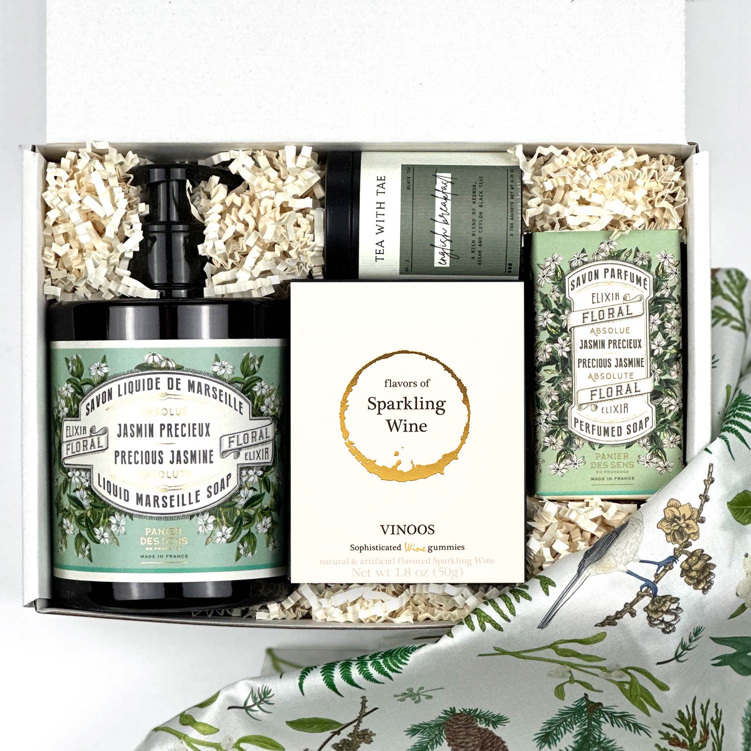 kadoo spa jasmine holiday curated gift box with panier des sens soaps, wine gummy, jasmine tea, and more.