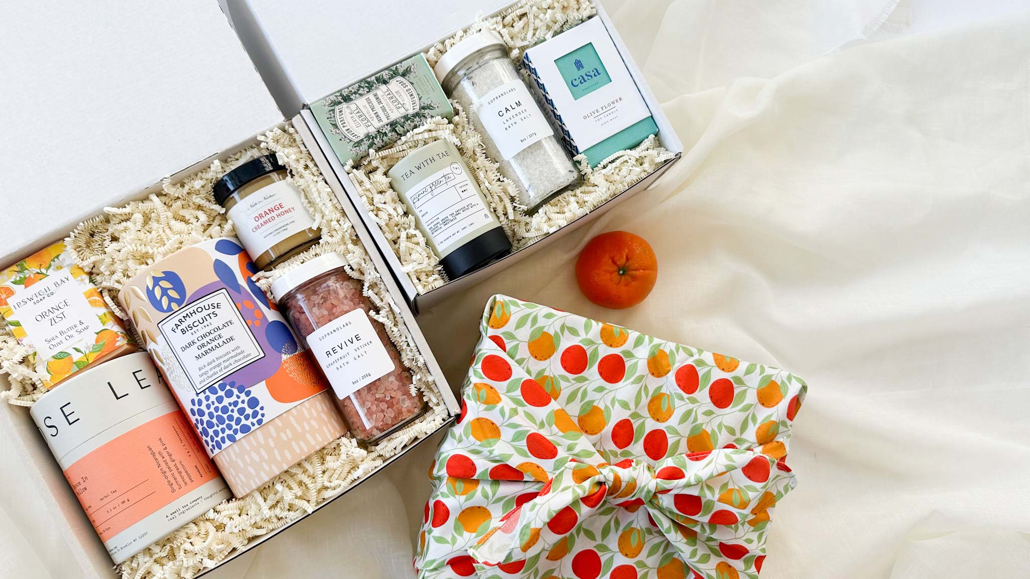 kadoo orange blossom gift box and spa calm gifts. Included: tea, cookie, candle, soap and more