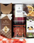 kadoo holiday sweater weather curated gift box with cinnamon swirl gourmet popcorn, assorted homemade toffees, cajun spice gourmet peanuts, dark chocolate california orange slices, artisan vegan crackers infused with olive oil and black truffle.