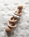 wooden silicone teething ring in birch and white color