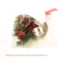 holiday dry bouquet with evergreen and red berries