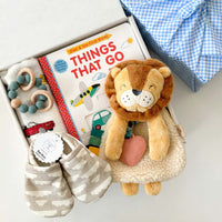 kadoo baby boy gifts things that go, include board book, lion plush, baby shoes, swaddle, teether & more.