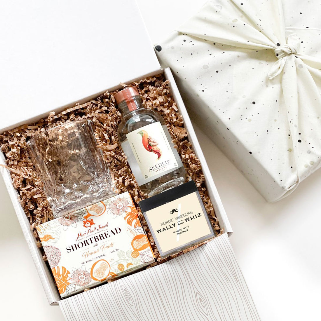 Father's day Cocktail Hour Curated Gifts with Seedlip drink, wally and whiz wine gum, viski whiskey glass and Maui fruit cookies.