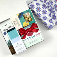 kadoo coffee and chocolate curated holiday gift box. Filled with shortbread cookies, chocolate, premium coffee and more. Wrapped in reusable Furoshiki fabric.