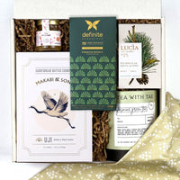 kadoo furoshiki holiday gift box with tea, cookie, honey, chocolate, candle and more
